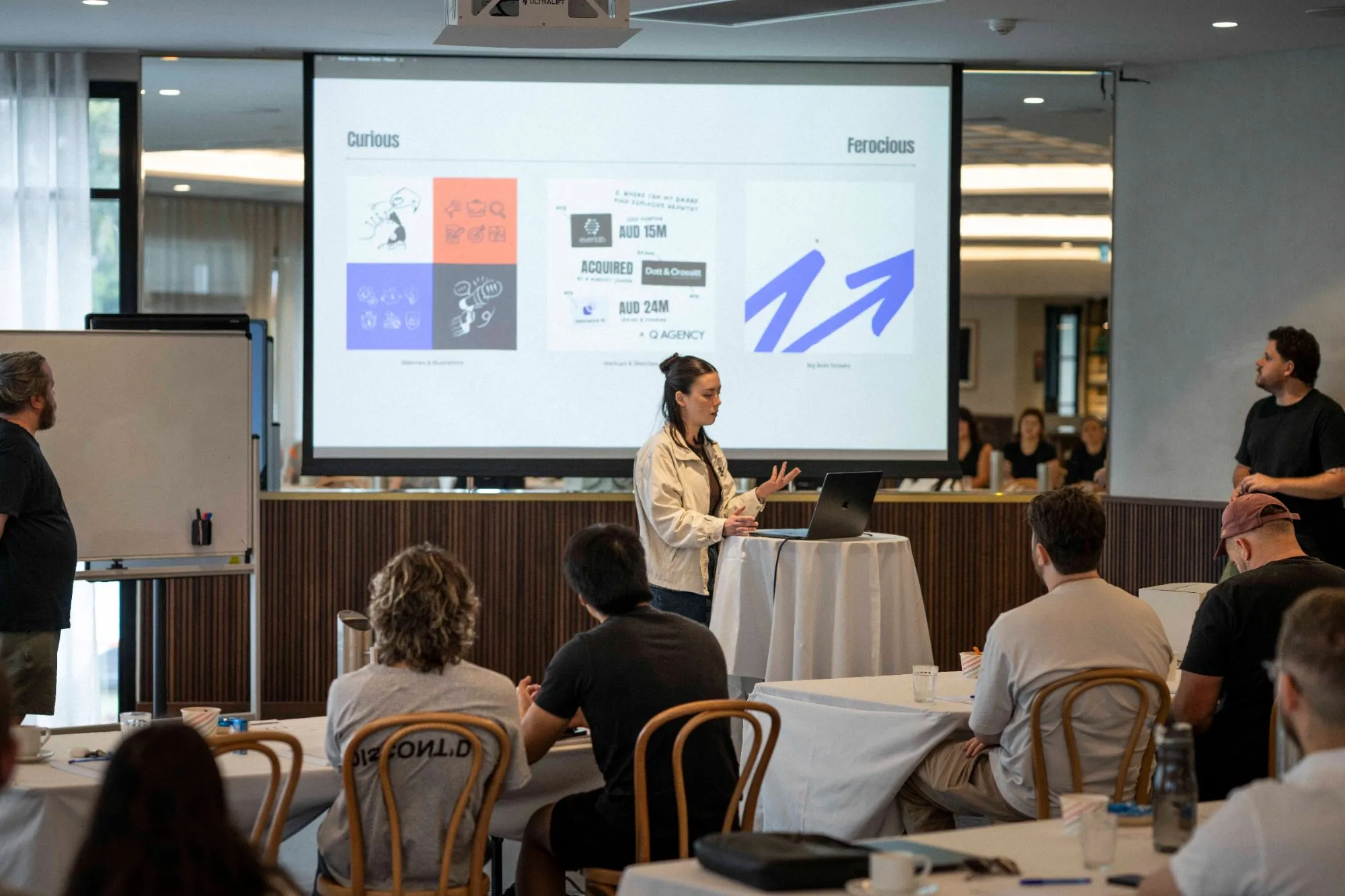 Q Agency team member presenting