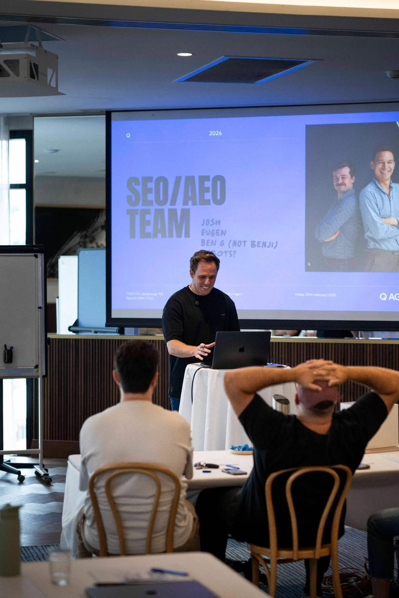 Josh Richardson presenting the SEO and AI search team's work at a Q Agency planning day