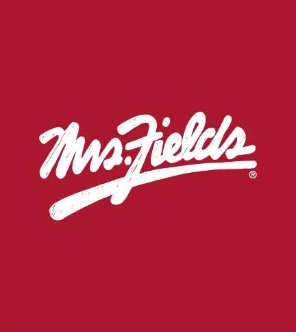 The Mrs Fields script logo in white on the brand's signature red