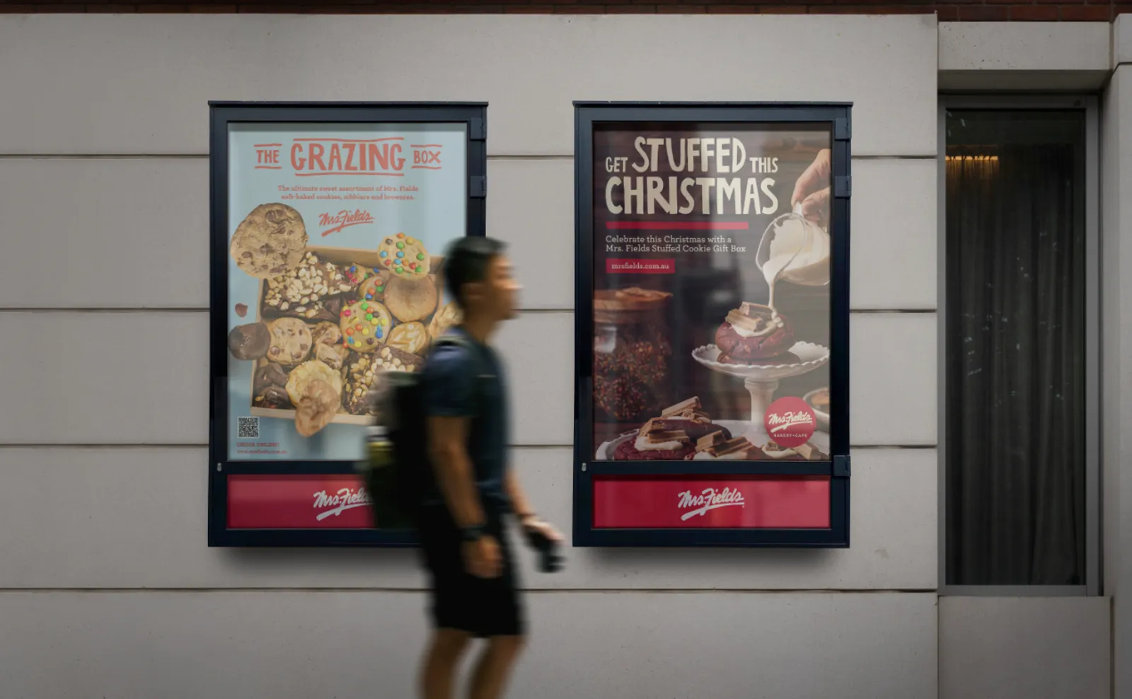 Mrs Fields street posters promoting The Grazing Box and a stuffed cookie Christmas gift box