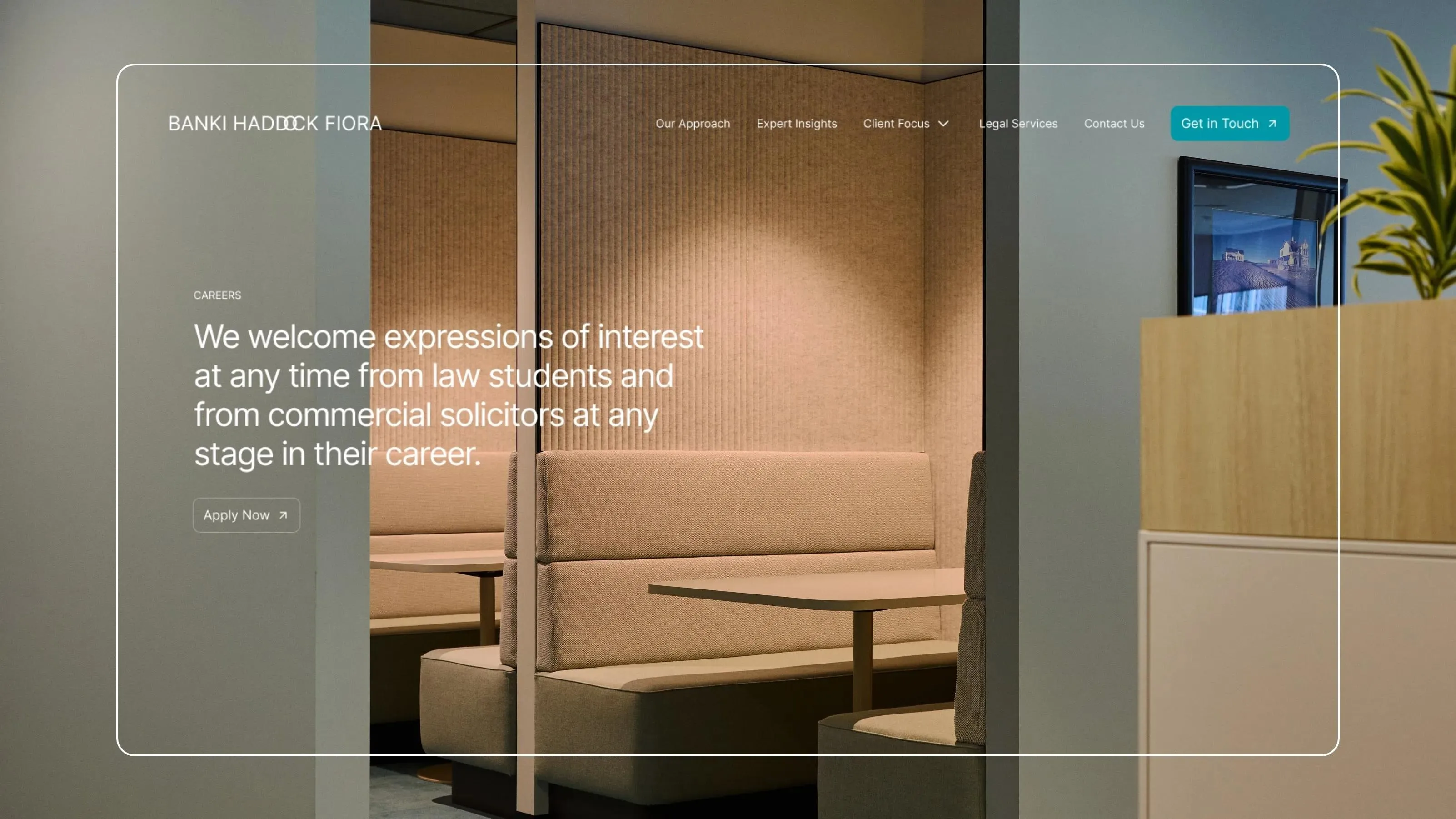 Careers page on the Banki Haddock Fiora site welcoming law students and commercial solicitors, over an office booth