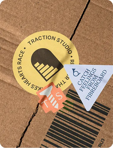 Traction Studio sticker set on packaging